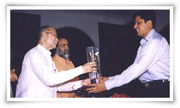 Mr. Avinash Jain receiving Award